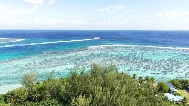 Huahine Island, French Polynesia. Aerial View of Coral Reefs, Turquoise Ocean and Green Coast