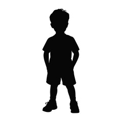 Obraz premium Young boy standing with hands in pockets child silhouette