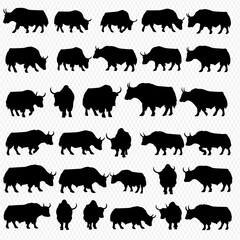 A collection of black silhouette illustrations depicting various poses and stances of yaks against a transparent background.
