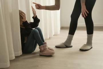 The bullying parent. Angry mother threatening and yelling to child. Harmful parenting method.	