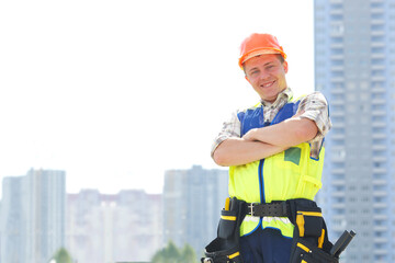 Joyful male construction worker. He completed the construction. Happy contractor at a building...