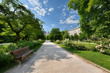 Fototapeta premium tranquil park in european capital showcasing verdant landscapes and serene pathways perfect for relaxation