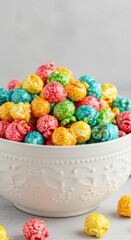 Fototapeta premium Colorful popcorn in a white bowl