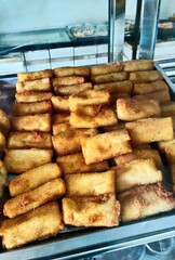  Golden Crispy Fried Cassava Sticks on Tray