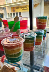 Sweet Layered Pudding in Plastic Cups