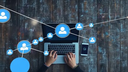 Person using a laptop with digital icons around - Powered by Adobe