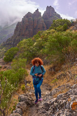 Fototapeta premium Hiker on mountain trail in Teno