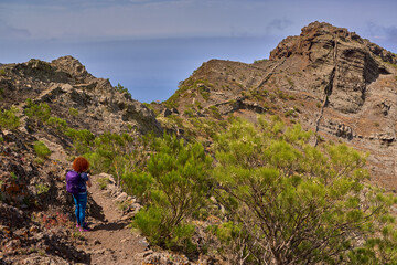 Active woman hiking in Teno mountains