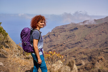 Active woman hiking in Teno mountains