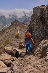 Active woman hiking in Teno mountains