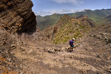 Hiker descending trail in Teno mountains