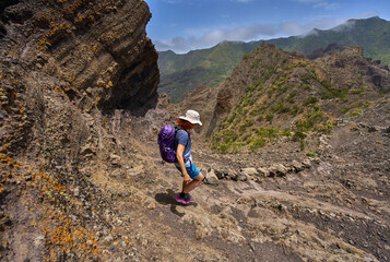 Hiker descending trail in Teno mountains
