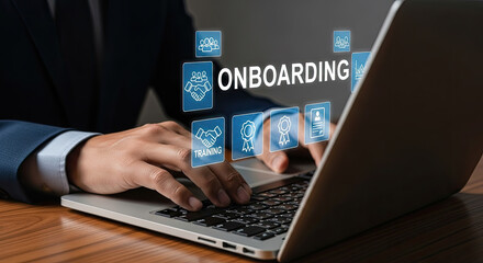 Effective Employee Onboarding Program: Businessman Using Laptop for New Hire Training and Integration, Streamlining Processes for Success.
