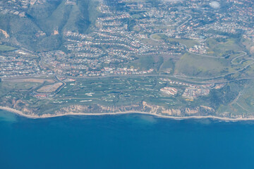 Aerial view of Trump National Golf Club Los Angeles on the Palos Verdes Peninsula, California, USA with coastal cliffs and the Pacific Ocean in the foreground