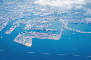 Aerial view of the Port of Long Beach, Los Angeles, California, USA with colorful containers, ships and industrial infrastructure