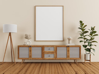 Interior mockup with wooden frame above rustic cabinet with rattan panels, floor lamp, and green plant in modern home