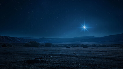 Star shining in clear night sky above remote desert valley. Christmas concept.  

