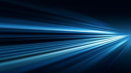 Abstract blue streaks radiating light conveying speed and futuristic energy on a dark background.