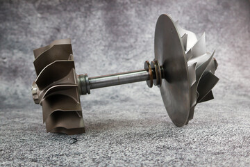 Close up Turbocharger rotor Shaft, impeller Shaft wheel turbocharger, turbine Shaft turbocharger on...