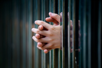 Hands Holding Together Between Glass Panels for Artistic Background