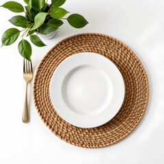 a table setting with a woven placemat under a white plate, suggesting a casual dining environment.