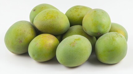 A Pile of Fresh Green Mangoes on White Background.