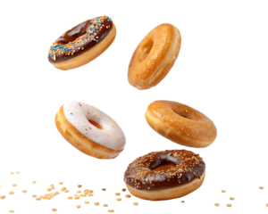 Assorted donuts falling isolated black background chocolate glaze