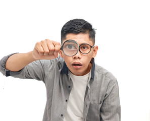 Man with Glasses Investigating with Magnifying Glass in Search Concept on White Background