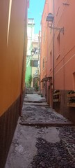narrow street in Bosa Sardinia Italy