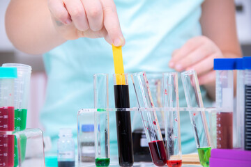 Young students practice in science class in laboratory, two primary children joyful confidence...