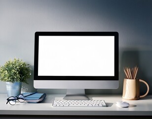 Fototapeta premium desktop with blank white computer screen mock up