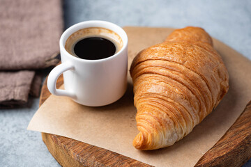 Simple yet delicious croissant served with espresso coffee