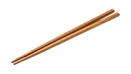 Natural wood chopsticks crossed on black background brown grain image