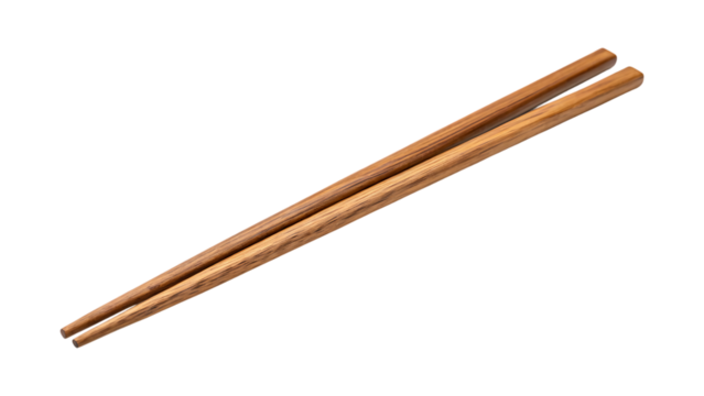 Natural wood chopsticks crossed on black background brown grain image