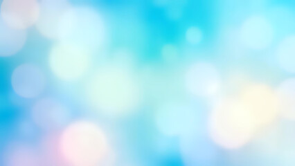 Soft blue and pink bokeh lights on a blurred abstract background.