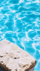 Obraz premium Summer Poolside Serenity, Stone and Turquoise Water