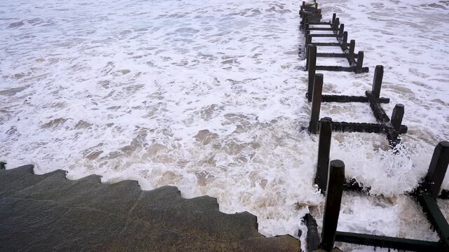 Waves crashing on shore, Croma, UK