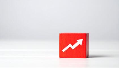 Red cube with an upward arrow, symbolizing business progress, finance and investment growth.
