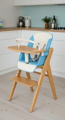 Light-colored wooden high chair with blue accents