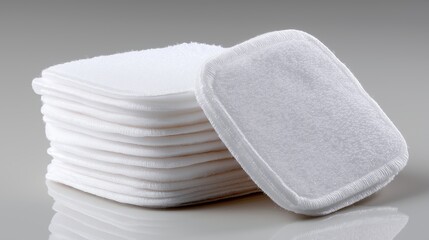 Soft and absorbent cotton pads stacked neatly for skincare use