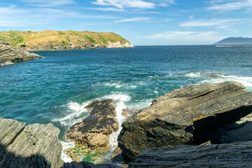 Beautiful rocky beaches of the fort around Forte São Mateus in Cabo Frio, the sea water lapping...