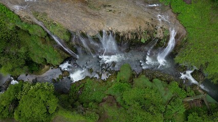 The spectacular waterfall at Marmore Falls, seen from a drone: the melted water from the glacier...