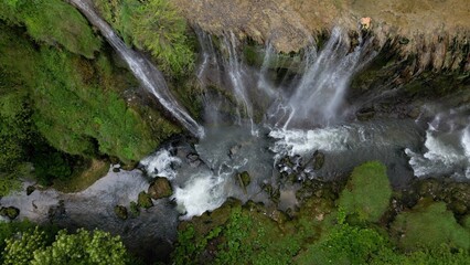 The spectacular waterfall at Marmore Falls, seen from a drone: the melted water from the glacier...