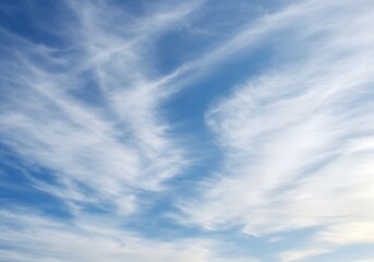 Fototapeta premium Beautiful Blue Sky with Wispy Clouds Serene Nature Background.