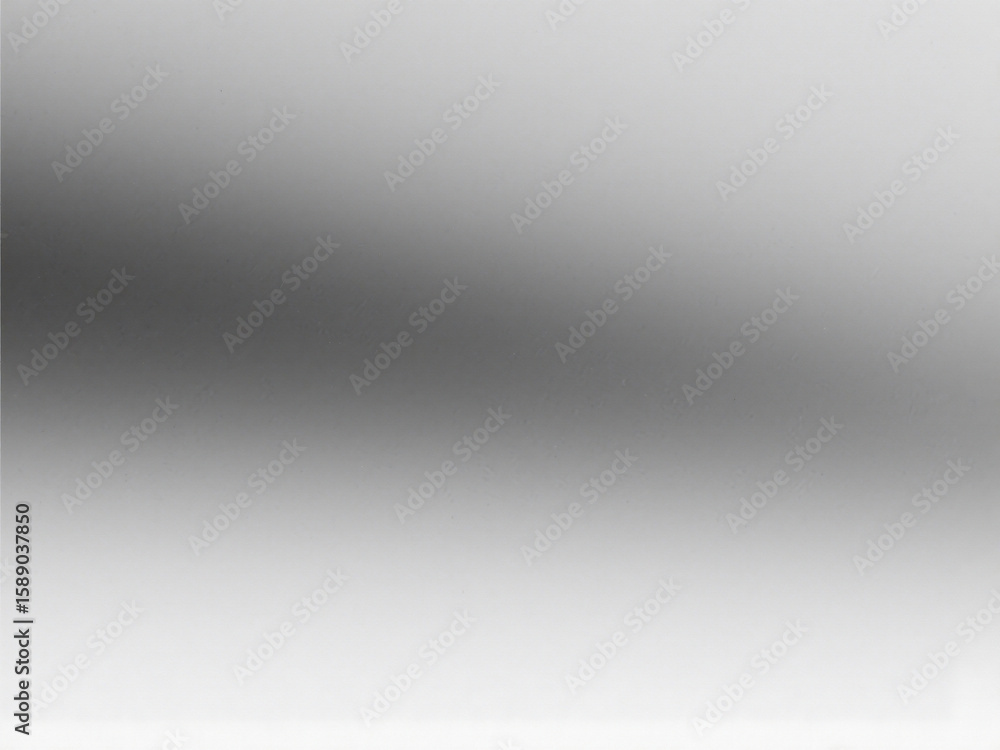 Aufkleber A gradient background with a smooth transition from dark gray to light gray creating a soft effect