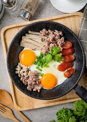 Skillet Egg,Pan Fried Egg with Toppings for morning breakfast ,thai called Khai Krata