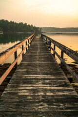 Naklejka premium Wooden boat ramp on a river