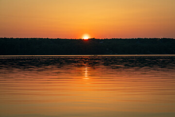 Sun setting on a river
