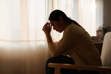 Silhouette depressed young asian woman with mental health problem in mind need crucial treatment from overthinking fatigue girl, disruptive thought, dissocial, anxiety and mental health disorders.