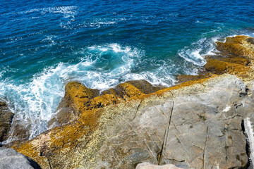 Top view of the back of Praia das Conchas. With crystal clear green waters and large rocks. Near the city of Cabo Frio, Rio de Janeiro.